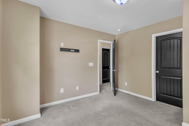 211 Westgrove Ct, Durham, NC 27703 - unfurnished bedroom featuring baseboards and carpet floors