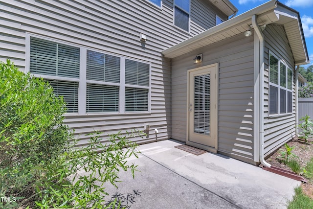 211 Westgrove Ct, Durham, NC 27703 - doorway to property with a patio