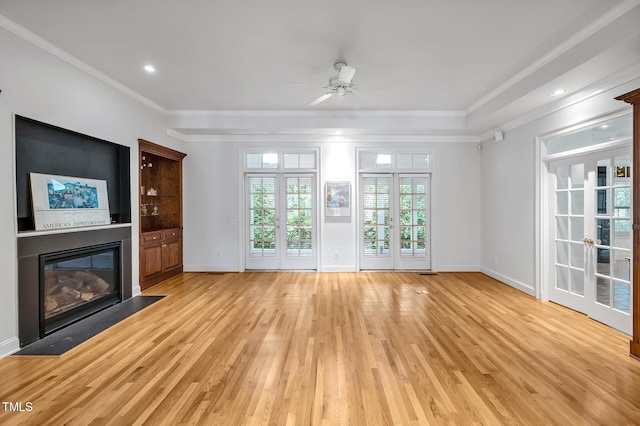 100 Sundance Pl, Chapel Hill, NC 27514 - unfurnished living room with light wood-style flooring, a fireplace with flush hearth, ornamental molding, a ceiling fan, and recessed lighting
