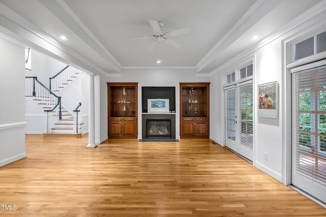 100 Sundance Pl, Chapel Hill, NC 27514 - unfurnished living room with a fireplace with flush hearth, light wood finished floors, stairs, ceiling fan, and recessed lighting