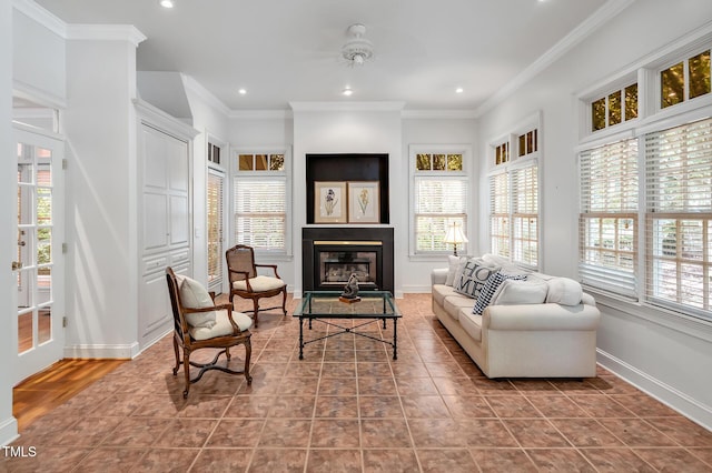 100 Sundance Pl, Chapel Hill, NC 27514 - tiled living area with crown molding, recessed lighting, and a glass covered fireplace