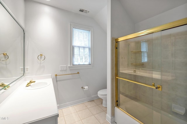 100 Sundance Pl, Chapel Hill, NC 27514 - bathroom featuring vanity, tile patterned flooring, vaulted ceiling, and bath / shower combo with glass door