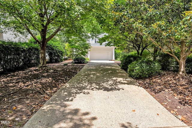 100 Sundance Pl, Chapel Hill, NC 27514 - view of front facade with driveway and a garage