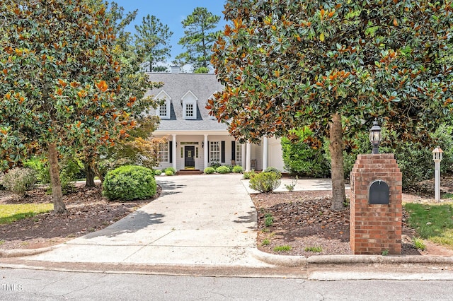 100 Sundance Pl, Chapel Hill, NC 27514 - view of front of property with driveway, a porch, and a shingled roof