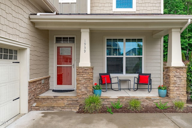 1939 Mostyn Ln, Apex, NC 27502 - doorway to property featuring a porch, board and batten siding, and stone siding