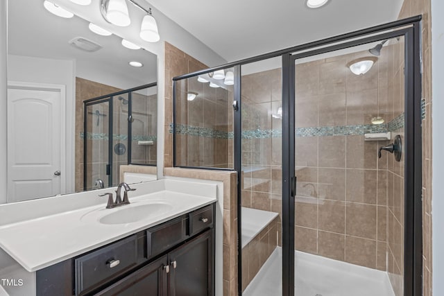 1939 Mostyn Ln, Apex, NC 27502 - bathroom featuring vanity, a shower stall, and recessed lighting