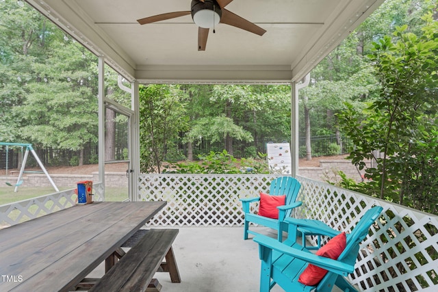 1939 Mostyn Ln, Apex, NC 27502 - view of patio / terrace featuring ceiling fan, outdoor dining space, and a playground