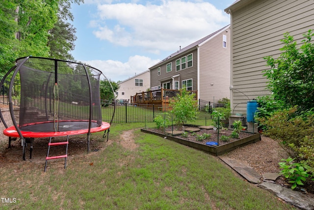 1939 Mostyn Ln, Apex, NC 27502 - view of yard with a trampoline and a vegetable garden