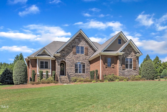 105 Somerley Dr, Garner, NC 27529 - craftsman house with a front lawn, stone siding, and brick siding