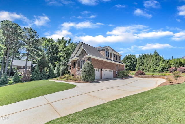 105 Somerley Dr, Garner, NC 27529 - view of home's exterior with an attached garage, brick siding, concrete driveway, a lawn, and stone siding