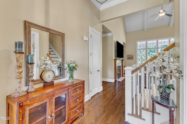 105 Somerley Dr, Garner, NC 27529 - foyer entrance featuring stairs, a ceiling fan, baseboards, wood finished floors, and a fireplace
