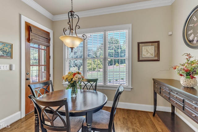 105 Somerley Dr, Garner, NC 27529 - dining area with plenty of natural light, wood finished floors, crown molding, and baseboards