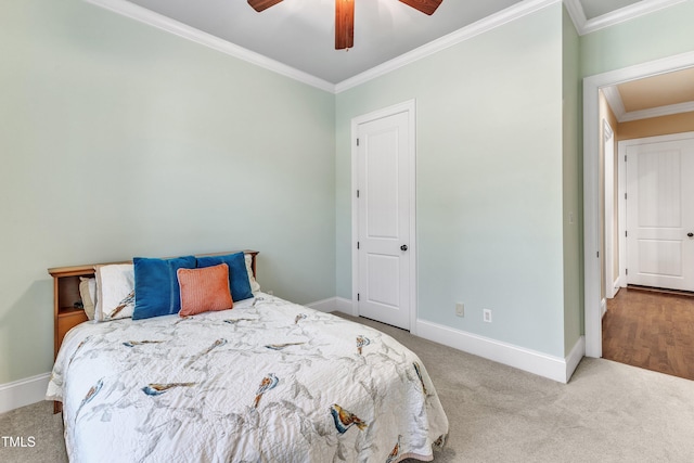 105 Somerley Dr, Garner, NC 27529 - carpeted bedroom featuring crown molding, baseboards, and ceiling fan