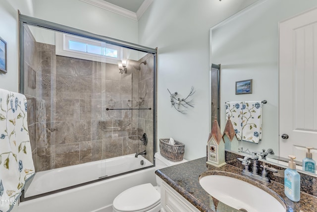 105 Somerley Dr, Garner, NC 27529 - bathroom featuring crown molding, vanity, toilet, and enclosed tub / shower combo
