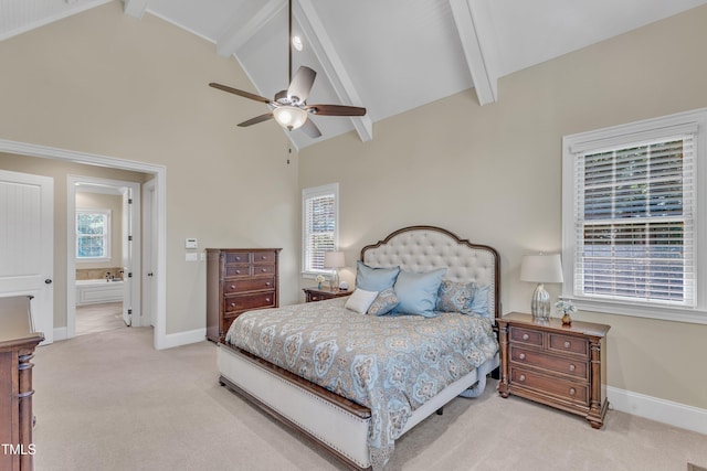 105 Somerley Dr, Garner, NC 27529 - carpeted bedroom with beam ceiling, multiple windows, baseboards, high vaulted ceiling, and ensuite bathroom