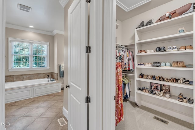 105 Somerley Dr, Garner, NC 27529 - spacious closet with light tile patterned floors