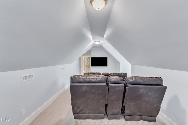 105 Somerley Dr, Garner, NC 27529 - carpeted cinema room featuring vaulted ceiling and baseboards