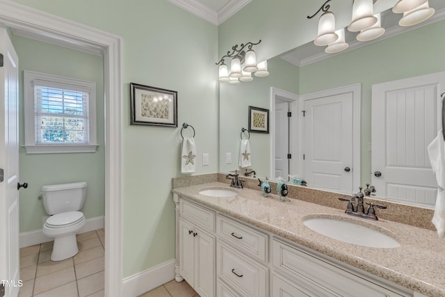 105 Somerley Dr, Garner, NC 27529 - full bath featuring double vanity, tile patterned flooring, ornamental molding, toilet, and baseboards