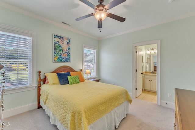 105 Somerley Dr, Garner, NC 27529 - bedroom featuring light carpet, ornamental molding, baseboards, ensuite bath, and a sink