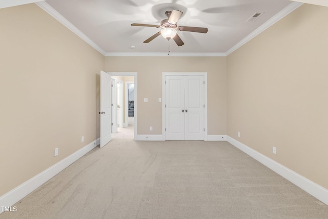 105 Somerley Dr, Garner, NC 27529 - unfurnished bedroom with crown molding, light colored carpet, baseboards, a closet, and a ceiling fan