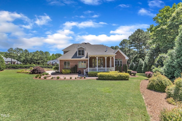 105 Somerley Dr, Garner, NC 27529 - rear view of property with brick siding, a yard, and a sunroom