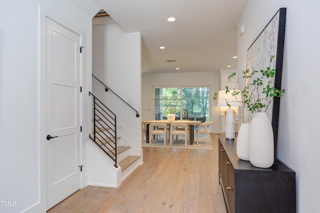 2114 Cowper Dr, Raleigh, NC 27608 - foyer featuring light wood-style flooring, stairway, and recessed lighting