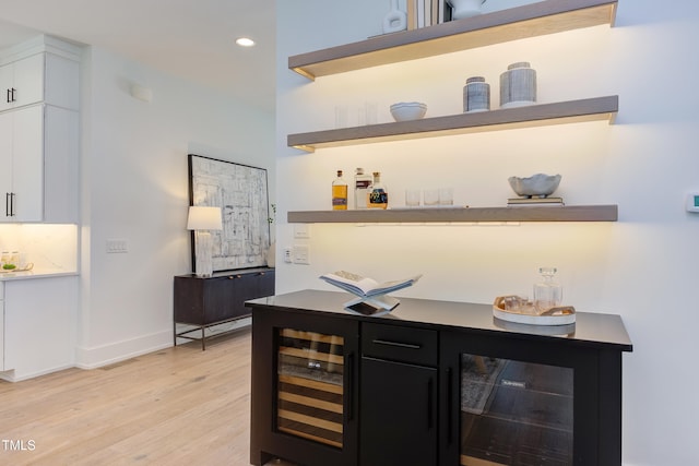 2114 Cowper Dr, Raleigh, NC 27608 - indoor dry bar featuring beverage cooler, light wood-style flooring, and recessed lighting