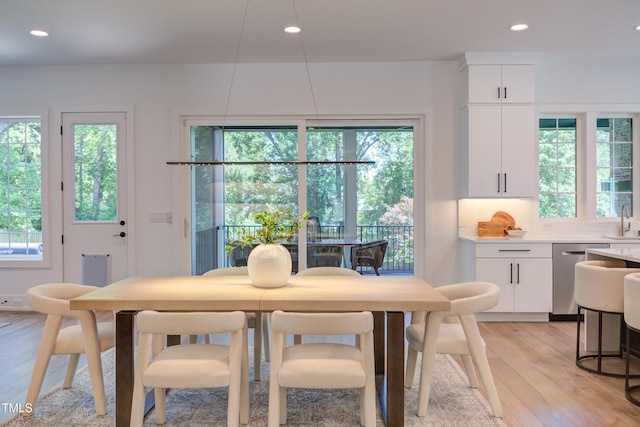 2114 Cowper Dr, Raleigh, NC 27608 - dining room featuring light wood-style flooring, recessed lighting, and healthy amount of natural light