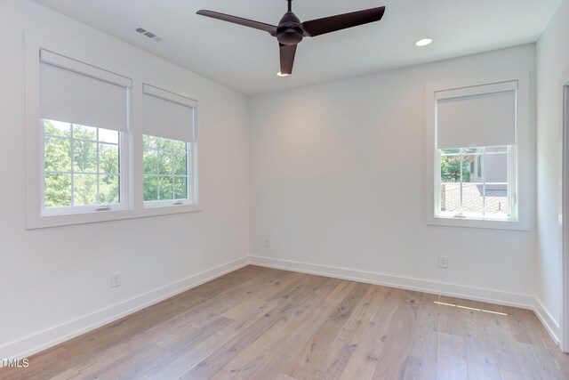 2114 Cowper Dr, Raleigh, NC 27608 - empty room with light wood-style flooring, ceiling fan, and recessed lighting