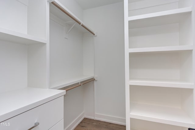 2114 Cowper Dr, Raleigh, NC 27608 - walk in closet with wood finished floors