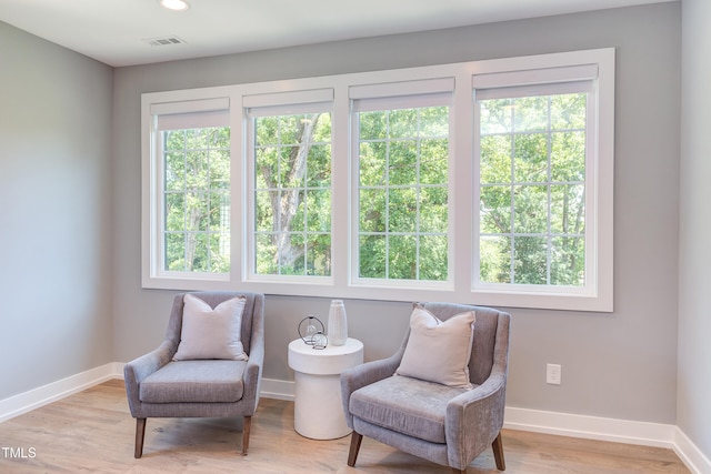 2114 Cowper Dr, Raleigh, NC 27608 - living area featuring wood finished floors and recessed lighting