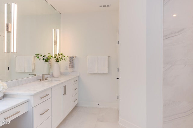 2114 Cowper Dr, Raleigh, NC 27608 - bathroom with vanity and marble finish floors