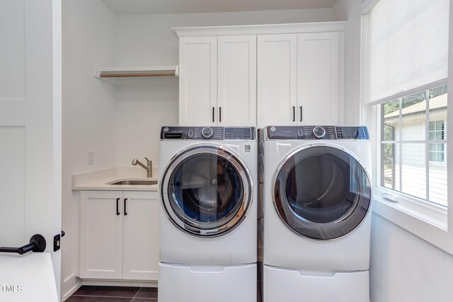 2114 Cowper Dr, Raleigh, NC 27608 - washroom with washer and clothes dryer and cabinet space