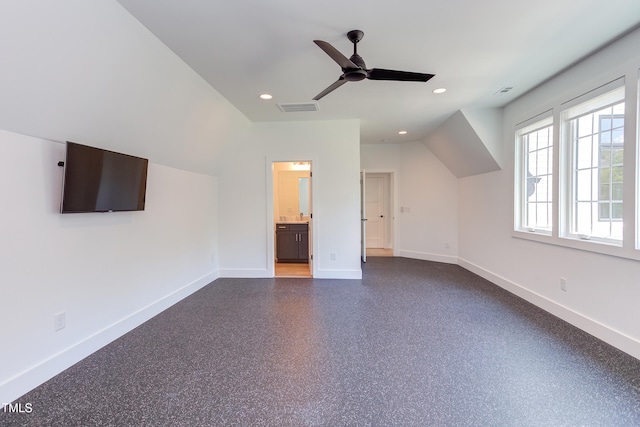 2114 Cowper Dr, Raleigh, NC 27608 - bonus room with a ceiling fan, recessed lighting, light aggregate flooring, and lofted ceiling