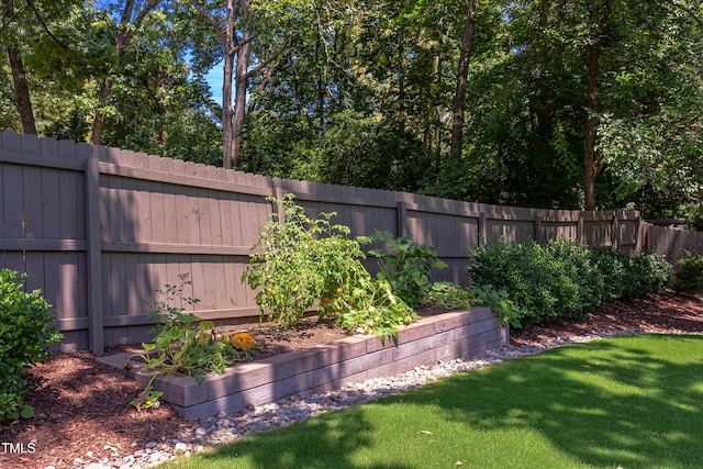 2114 Cowper Dr, Raleigh, NC 27608 - view of yard with a vegetable garden