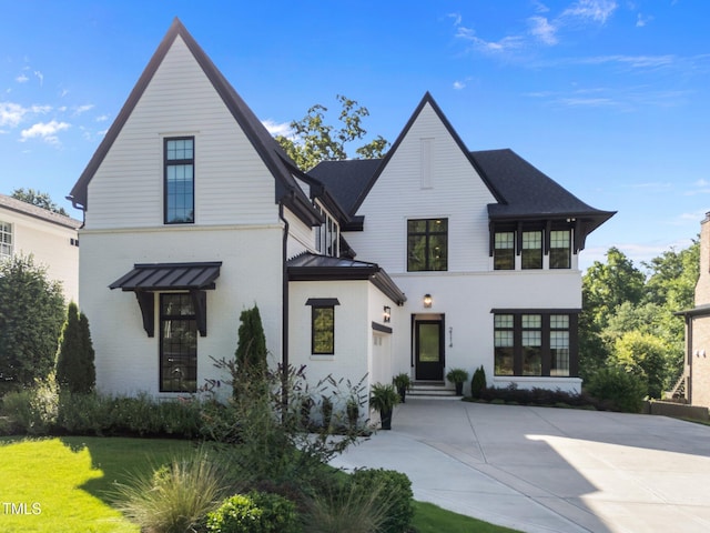 2114 Cowper Dr, Raleigh, NC 27608 - view of front of home with brick siding and a front lawn