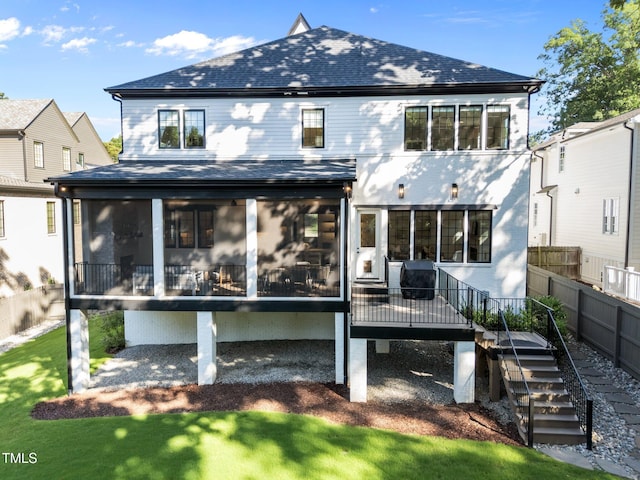 2114 Cowper Dr, Raleigh, NC 27608 - rear view of property featuring a sunroom, a shingled roof, and stairs