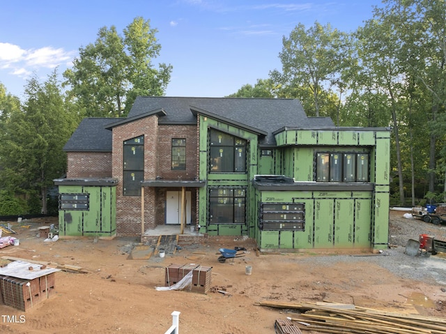 1925 Hunting Ridge Rd, Raleigh, NC 27615 - view of front of home with brick siding and a shingled roof