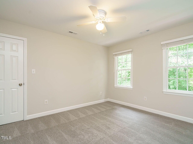 9020 Branch Creek Way, Apex, NC 27539 - empty room with a ceiling fan and carpet