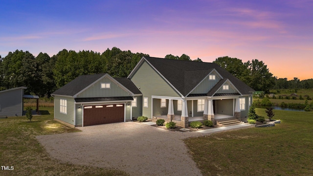 540 Pine Ridge Rd, Zebulon, NC 27597 - craftsman house with a porch, board and batten siding, driveway, a lawn, and an attached garage