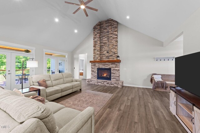 540 Pine Ridge Rd, Zebulon, NC 27597 - living room with french doors, ceiling fan, high vaulted ceiling, wood finished floors, and baseboards