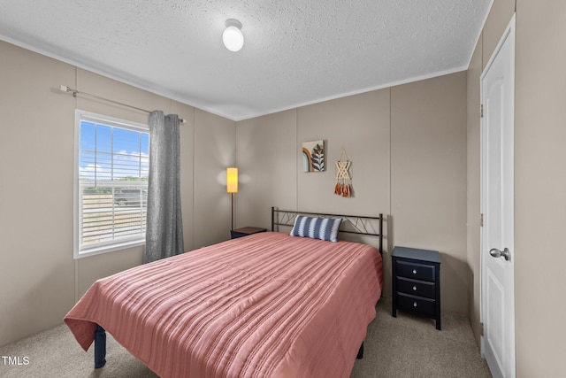 540 Pine Ridge Rd, Zebulon, NC 27597 - bedroom with carpet flooring, a textured ceiling, and crown molding