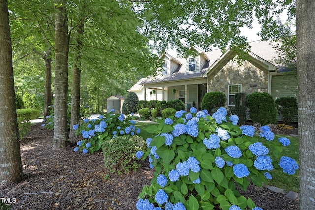 150 Churchill Rd, Louisburg, NC 27549 - view of front of house featuring stone siding