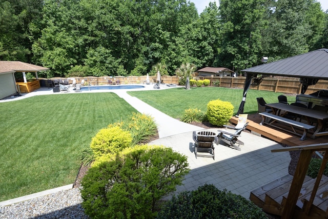 150 Churchill Rd, Louisburg, NC 27549 - view of yard with a gazebo, an outdoor fire pit, a hot tub, and a patio