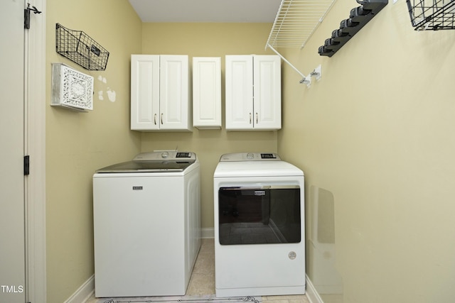 150 Churchill Rd, Louisburg, NC 27549 - laundry area with cabinet space, separate washer and dryer, and baseboards