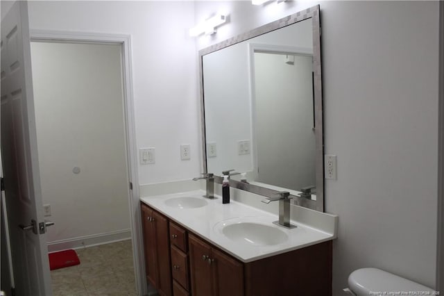 625 Marshtree Ln Unit 101, Fayetteville, NC 28314 - bathroom with double vanity and toilet
