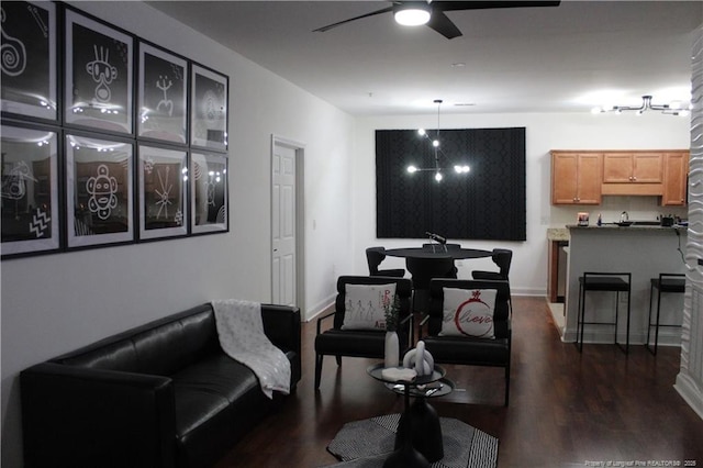 625 Marshtree Ln Unit 101, Fayetteville, NC 28314 - living area featuring ceiling fan, dark wood-style flooring, and baseboards