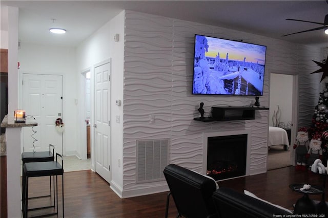625 Marshtree Ln Unit 101, Fayetteville, NC 28314 - living room with a ceiling fan, wood finished floors, a fireplace, and baseboards