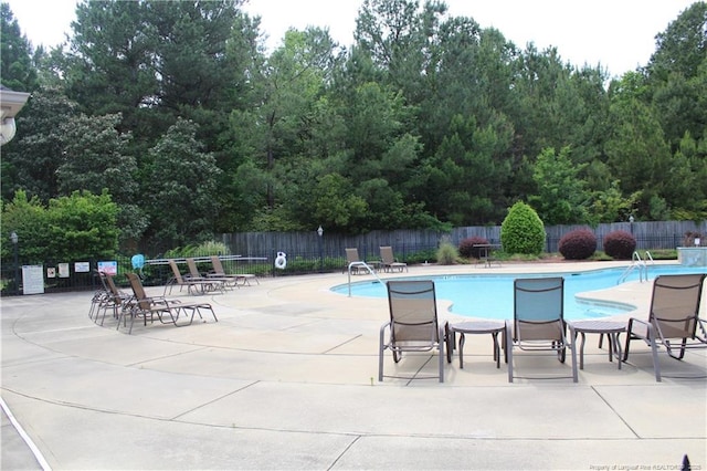 625 Marshtree Ln Unit 101, Fayetteville, NC 28314 - community pool featuring a patio