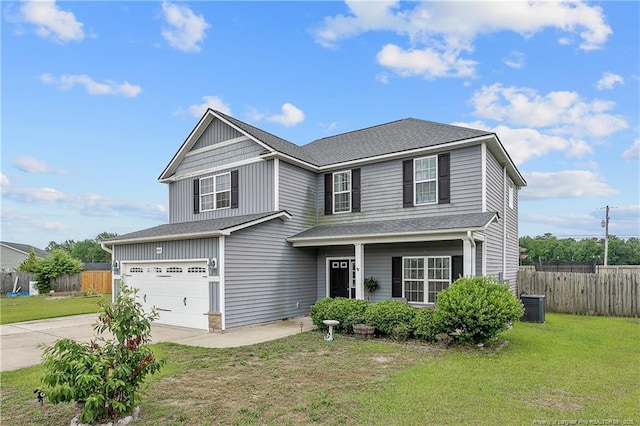 4943 Lion Heart Ln, Parkton, NC 28371 - traditional home with driveway, cooling unit, an attached garage, and roof with shingles